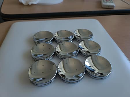 What is electroplating and how does it differ from other plating methods?